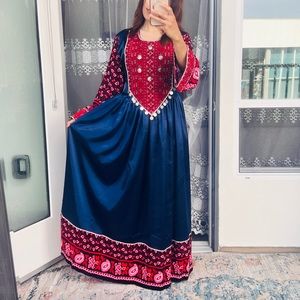 Satin dress in rich blue color and designed with floral linen